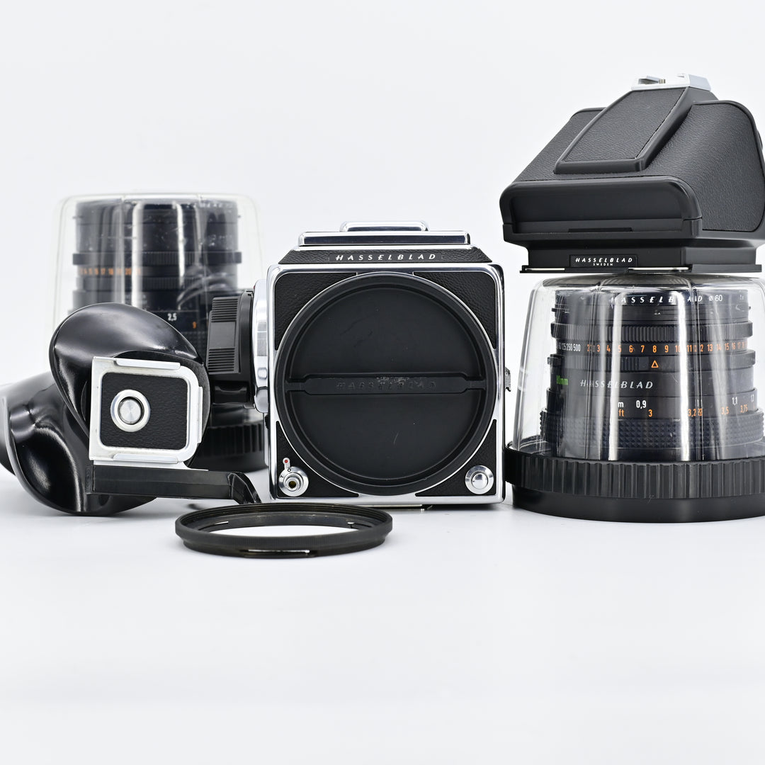 Hasselblad 500C/M + 80mm F2.8 +  150mm F4 + A12 film magazine.