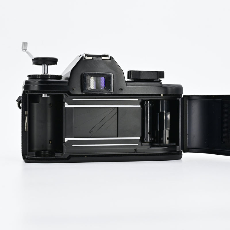 Nikon EM Black + Tokina SD 70-210mm F4.0-5.6 Lens