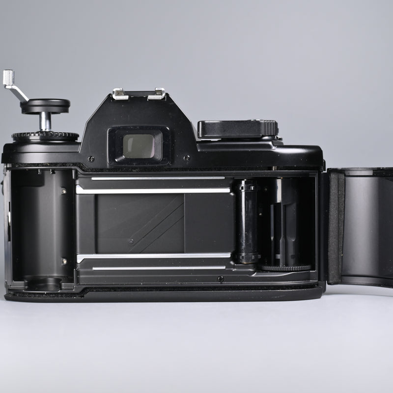Nikon EM Black + Zoom-Nikkor 43-86/3.5 Lens