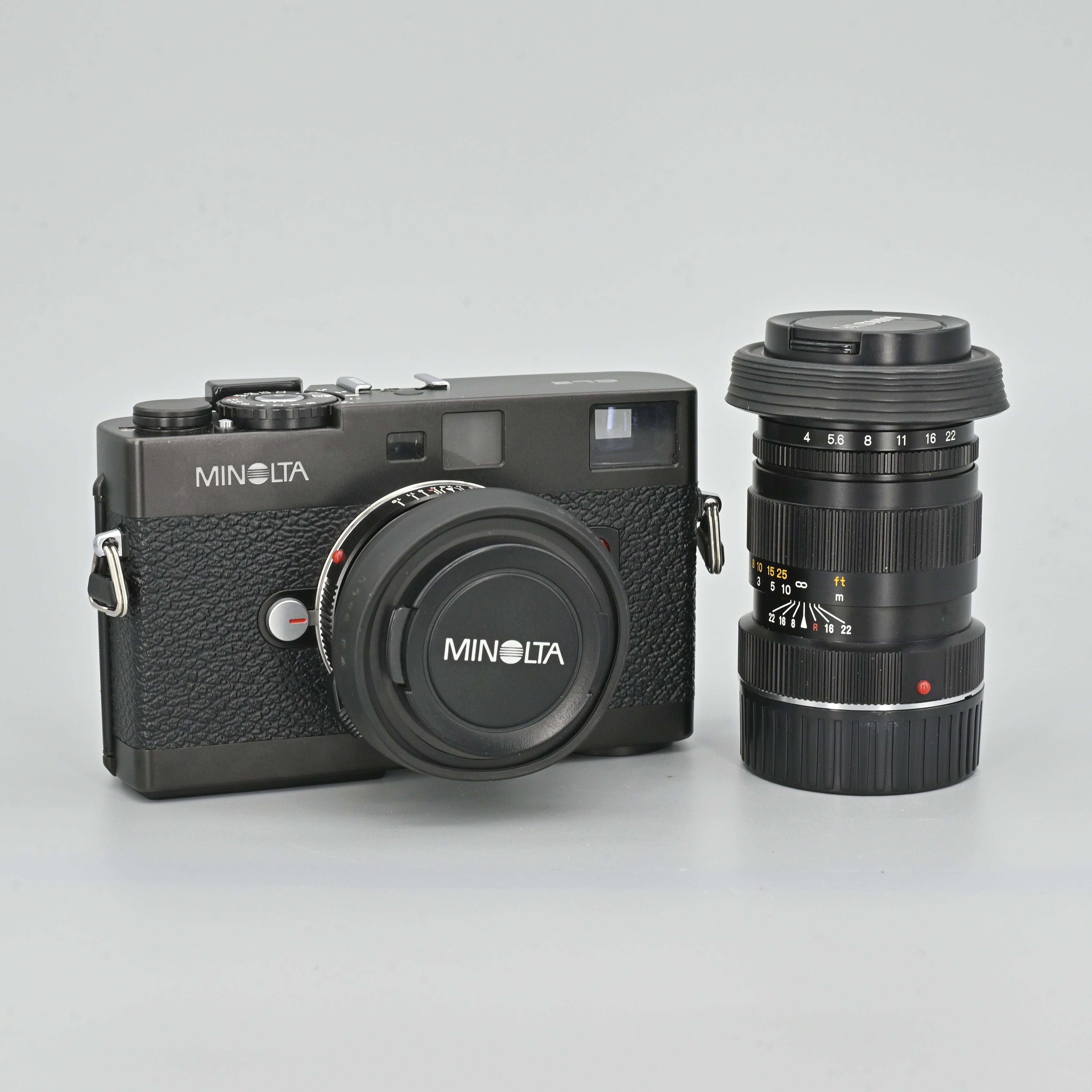 Minolta CLE Body + M-Rokkor 40mm F2 + M-Rokkor 90mm F4 Set. – SHOWA