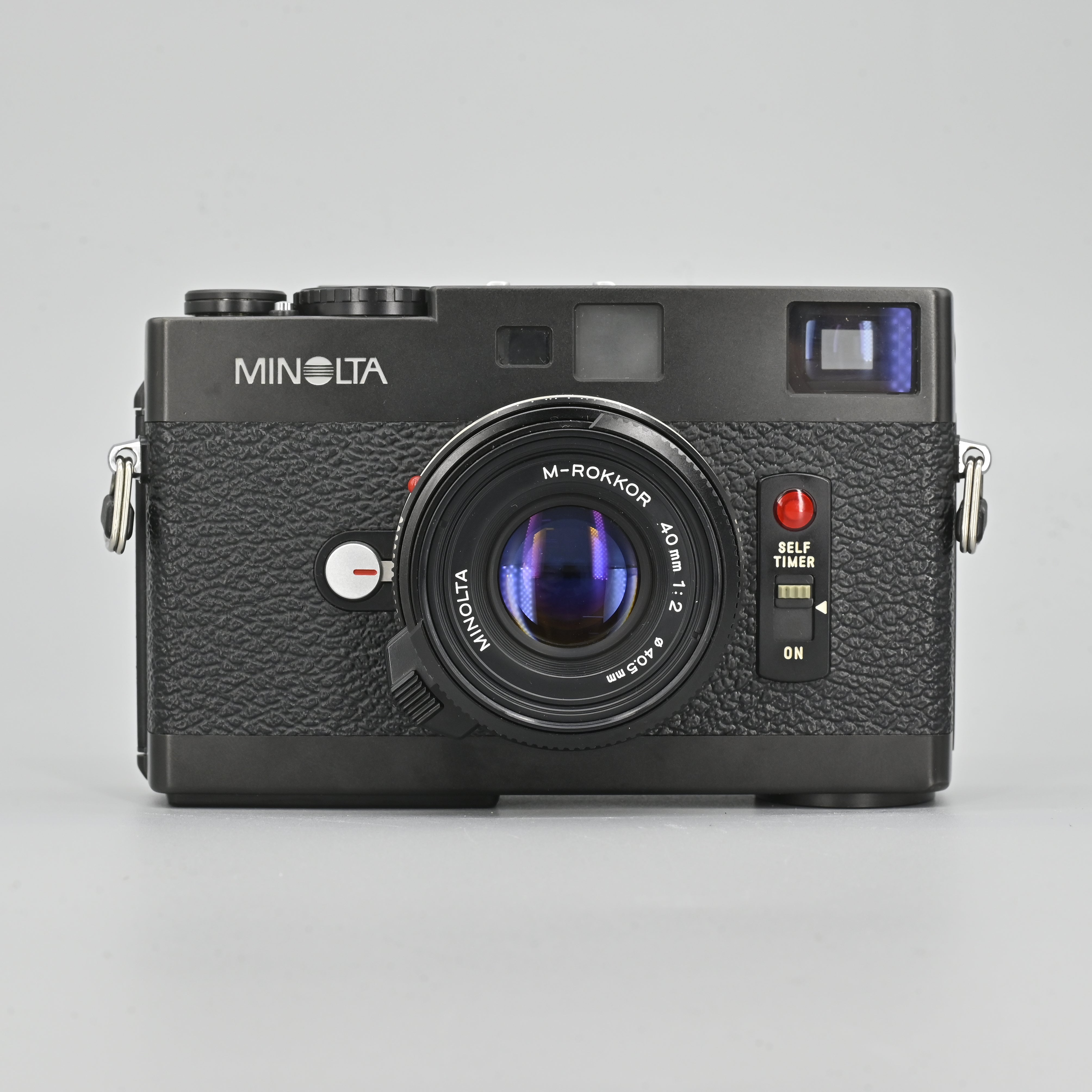 Minolta CLE Body + M-Rokkor 40mm F2 + M-Rokkor 90mm F4 Set. – SHOWA