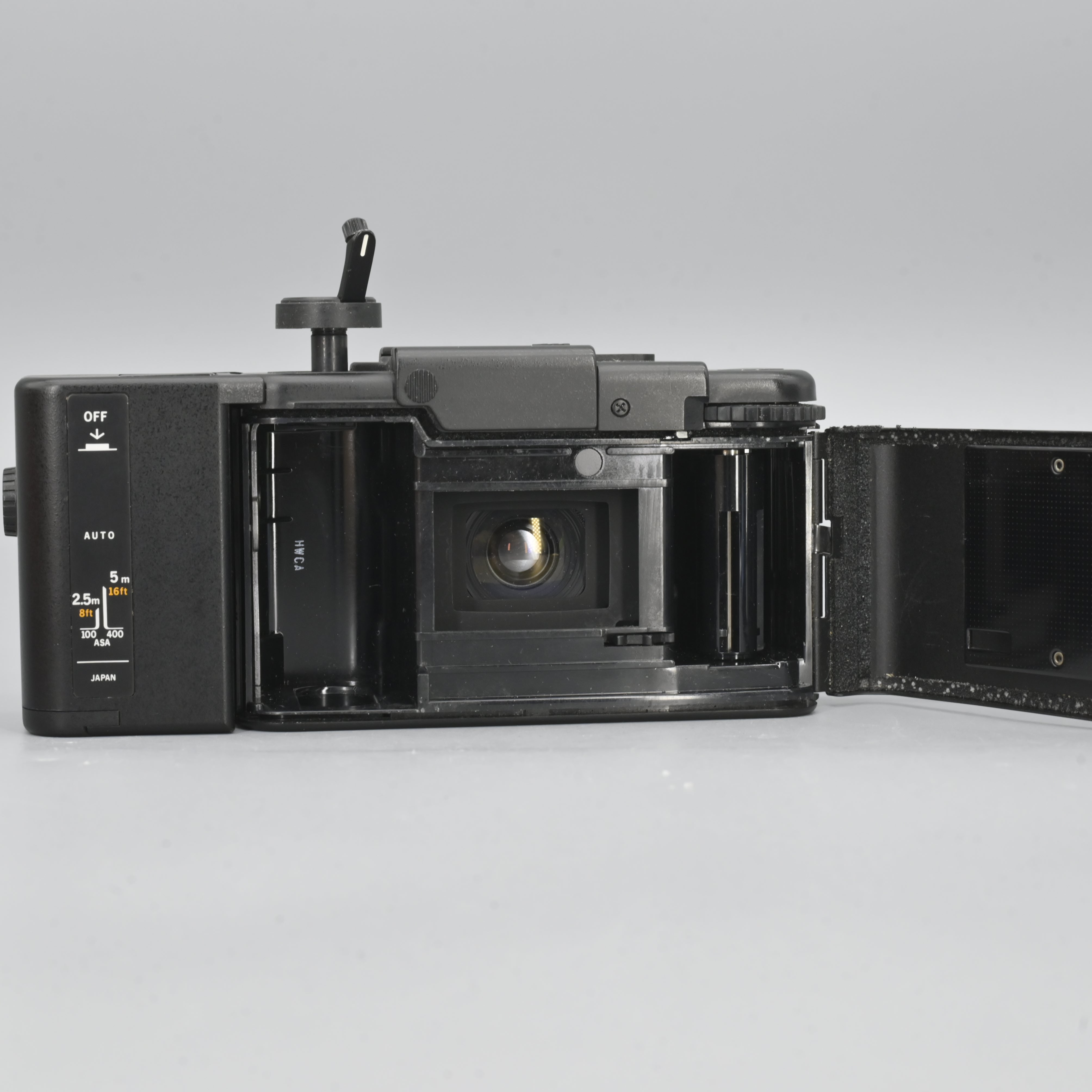 Olympus XA + A11 Flash. – SHOWA