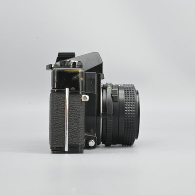 Minolta SRT100 + MD 50mm F2 Lens + JCPenney MD 135mm F2.8 Lens [READ]